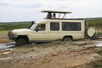 Safari vehicle with tourists