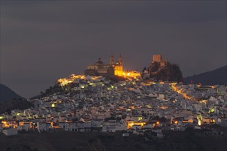 The hilltop White Town of Olvera with La Encarnacion church and the Moorish castle