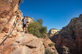 Young man hiking on Angels Landing Trail