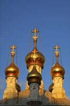 Gilded onion towers of the Russian Orthodox Church in Geneva in the evening light
