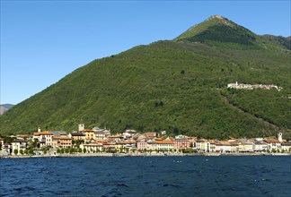 Cannobio on Lake Maggiore with the hamlet of Sant'Agata in a deciduous forest on a mountain slope