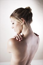 Bare back of a young woman