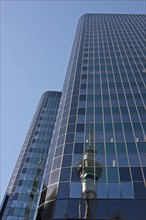 Reflection of the Sky Tower in the Philip Fox Building