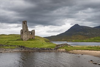 Ruins of Ardvreck Castle on a peninsula in the lake of Loch Assynt