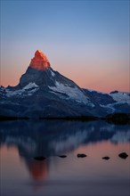 Matterhorn at sunrise reflected in the Stellisee