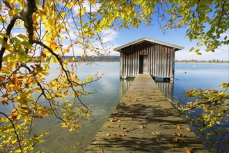 Fisherman's hut in autumn at Kochelsee Lake