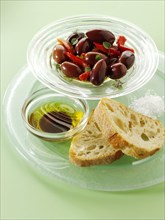 Olives with ciabatta bread and oil for dipping