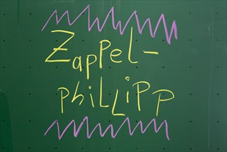 Zappelphillipp' written with chalk on a blackboard