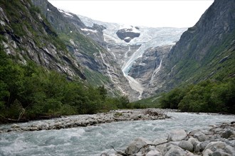 Kjenndalsbreen Glacier with a mountain river