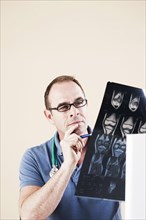 Doctor looking at an X-ray