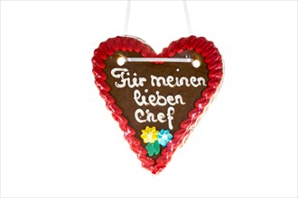 Gingerbread heart with writing 'Fuer meinen lieben Chef'