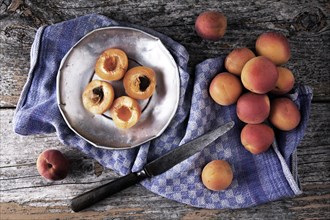 Fresh apricots on a tin plate