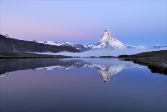 Matterhorn reflected in Lake Stellisee at dusk