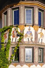 Mural painting Postreiter at the bay window of Hotel zur Post