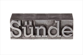 Old lead letters forming the word 'Suende'