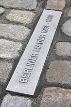 Marking on the ground showing the course of the former Berlin Wall