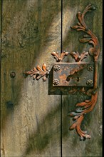 Old doorlock on a door of the Muehlfeldkirche church