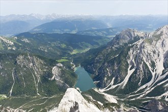 Panoramic view of the Alps from the peak of Mt Seekofel towards the north with Pragser Wildsee Lake