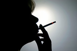 Woman smoking a cigarette