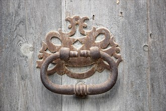 Knocker on an old wooden door