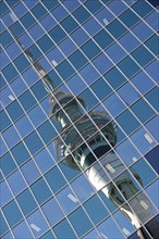 Reflection of the Sky Tower in the Philip Fox Building