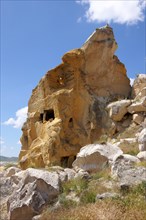 Ancient cave houses in volcanic tuft rock formations