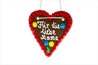 Gingerbread heart with writing 'Fuer die liebe Mama'