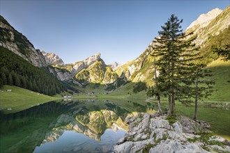 Mountains reflected at sunrise in Lake Seealpsee