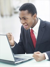 Businessman using a laptop in an office