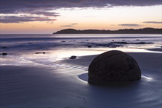 Moeraki Boulders on the beach at sunrise