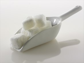 Chunky white refined sugar cube