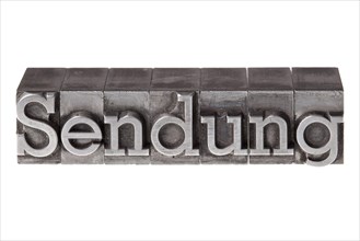 Old lead letters forming the word 'Sendung'