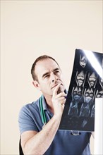 Doctor looking at an X-ray
