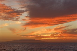 Evening sky with clouds and El Hierro island