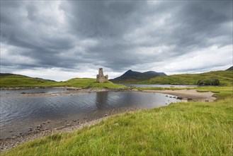 Ruins of Ardvreck Castle on a peninsula in the lake of Loch Assynt