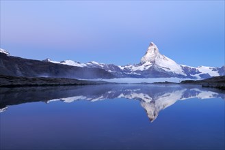 Mt Matterhorn reflected in Stellisee Lake at dusk