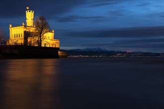 Schloss Montfort Castle on Lake Constance at dusk