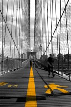 Brooklyn Bridge with yellow markings for pedestrians