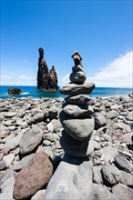 Cairns built as good luck charms at the Ilheus da Rib rock formation