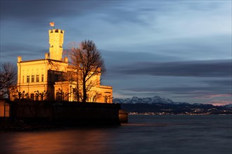 Schloss Montfort Castle on Lake Constance at dusk