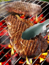 Sirloin steak on a BBQ grill