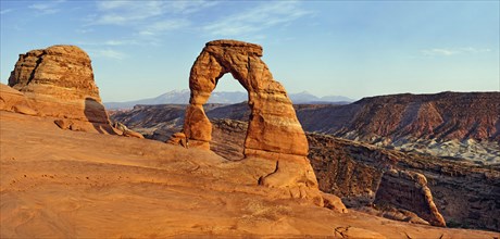 Delicate Arch natural stone arch in front of the La Sal Mountains