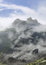 Steam rising from a lava field at the foot of Brennisteinsalda Volcano