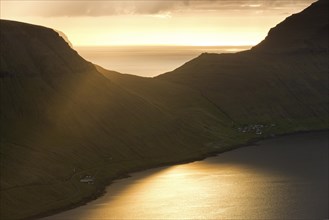 Dramatic mood lighting over the island of Kalsoy