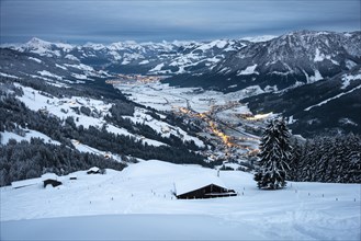 View of the Brixental valley in winter at dusk