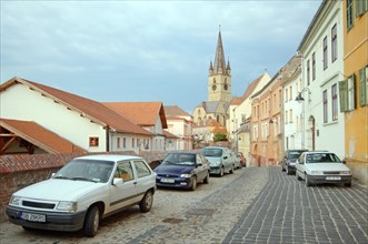 Cars parked in the historic city centre