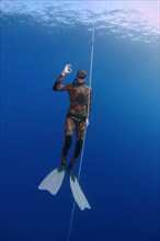 Freediver wearing swimfins