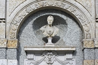 Stone bust on a wall of the Bavarian National Museum