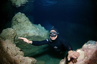 Freediver in a cave