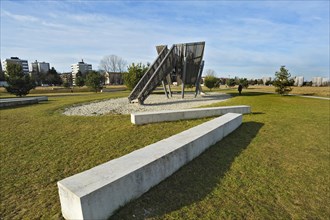 Concrete benches and a slide on a playground